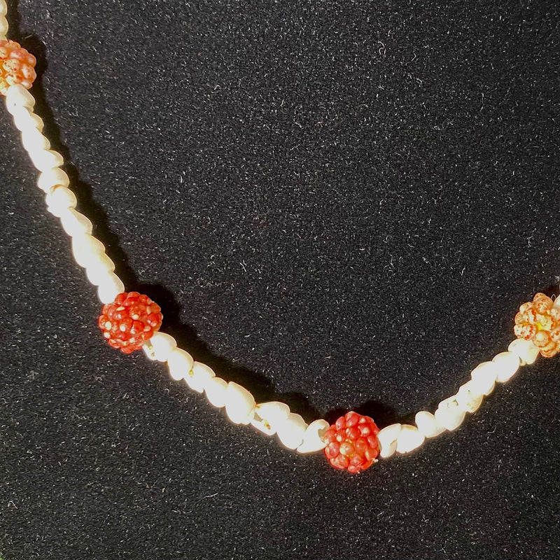 Ni'ihau White Momi Shells accented with Kahelelani pearl beads Lei