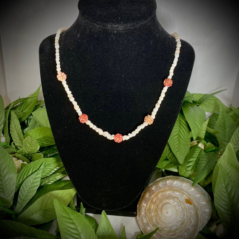 Ni'ihau White Momi Shells accented with Kahelelani pearl beads Lei