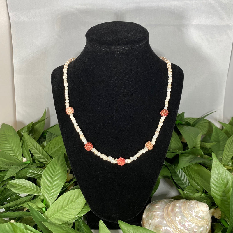 Ni'ihau White Momi Shells accented with Kahelelani pearl beads Lei