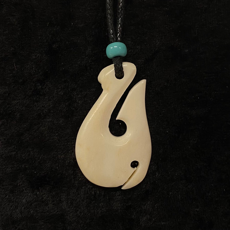 Carved Buffalo Bone Fish Hook with Blue Glass Bead