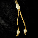 Buffalo Bone 1 Barb Fish Hook Pendant - Tan Cord