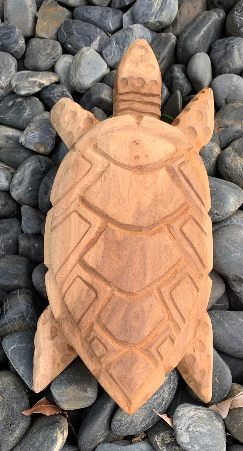 Carved Honu (Turtle) Laying on the Beach