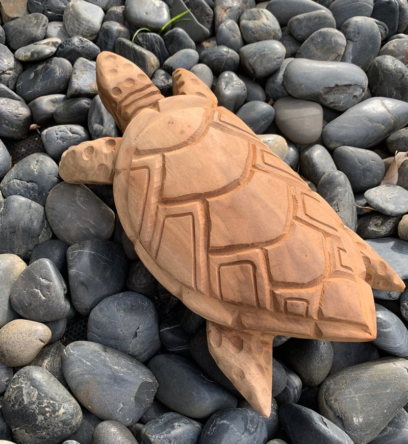 Carved Honu (Turtle) Laying on the Beach