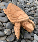 Carved Honu (Turtle) Laying on the Beach